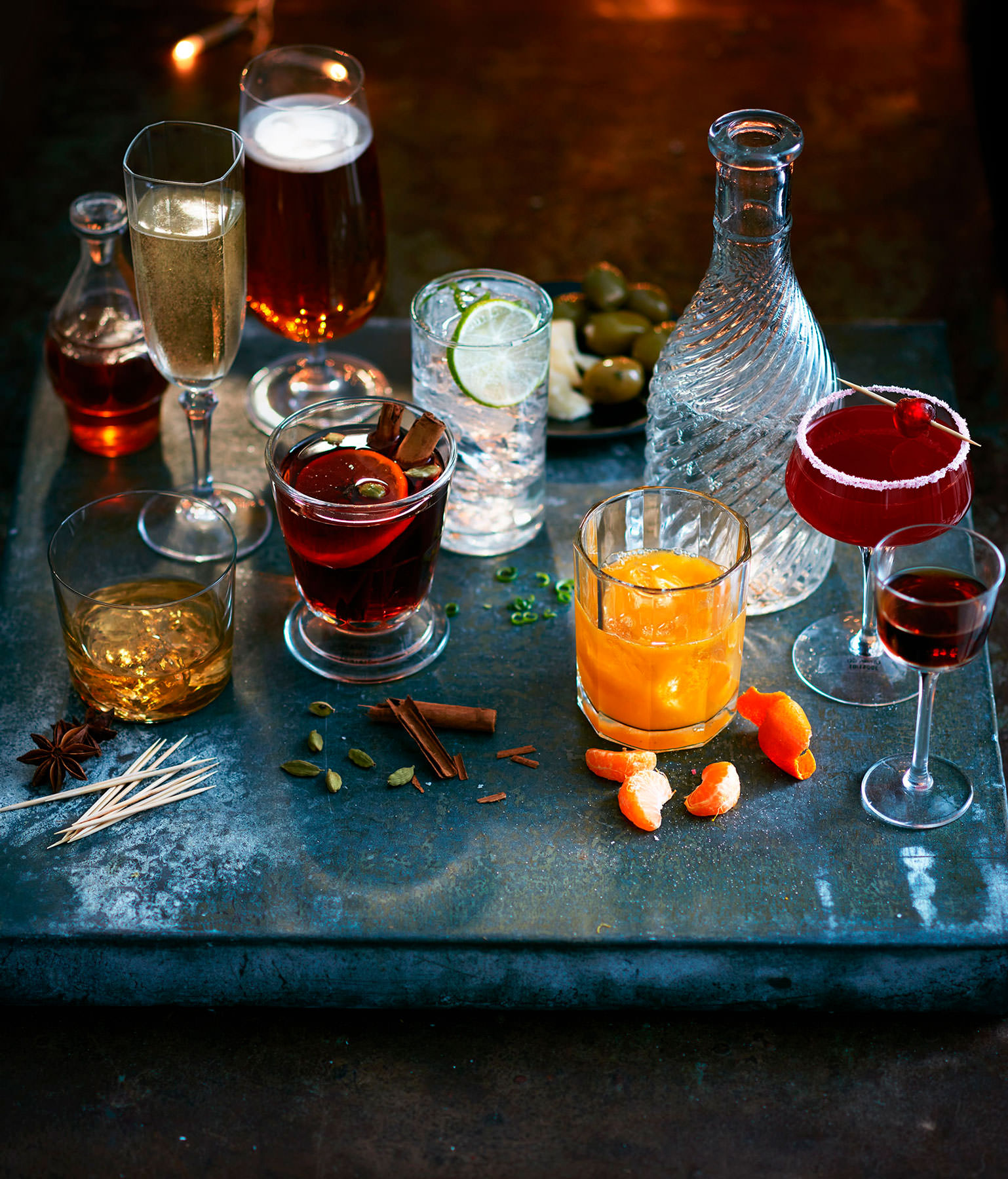 a selection of cocktails placed on a metal tray with mixers ready to drink - London Food & Drinks Photographer