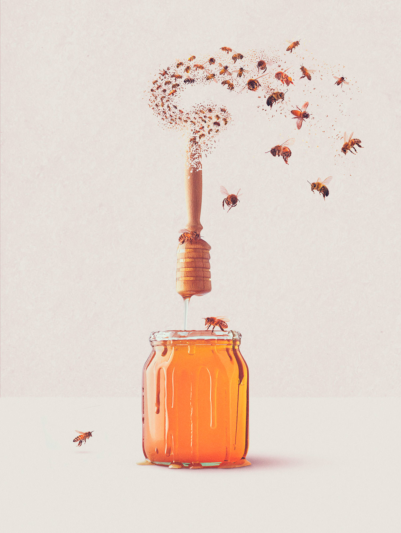 Honey stirrer breaking apart and transforming into a swarm of bees over a honey jar.  - London Food & Drinks Photographer
