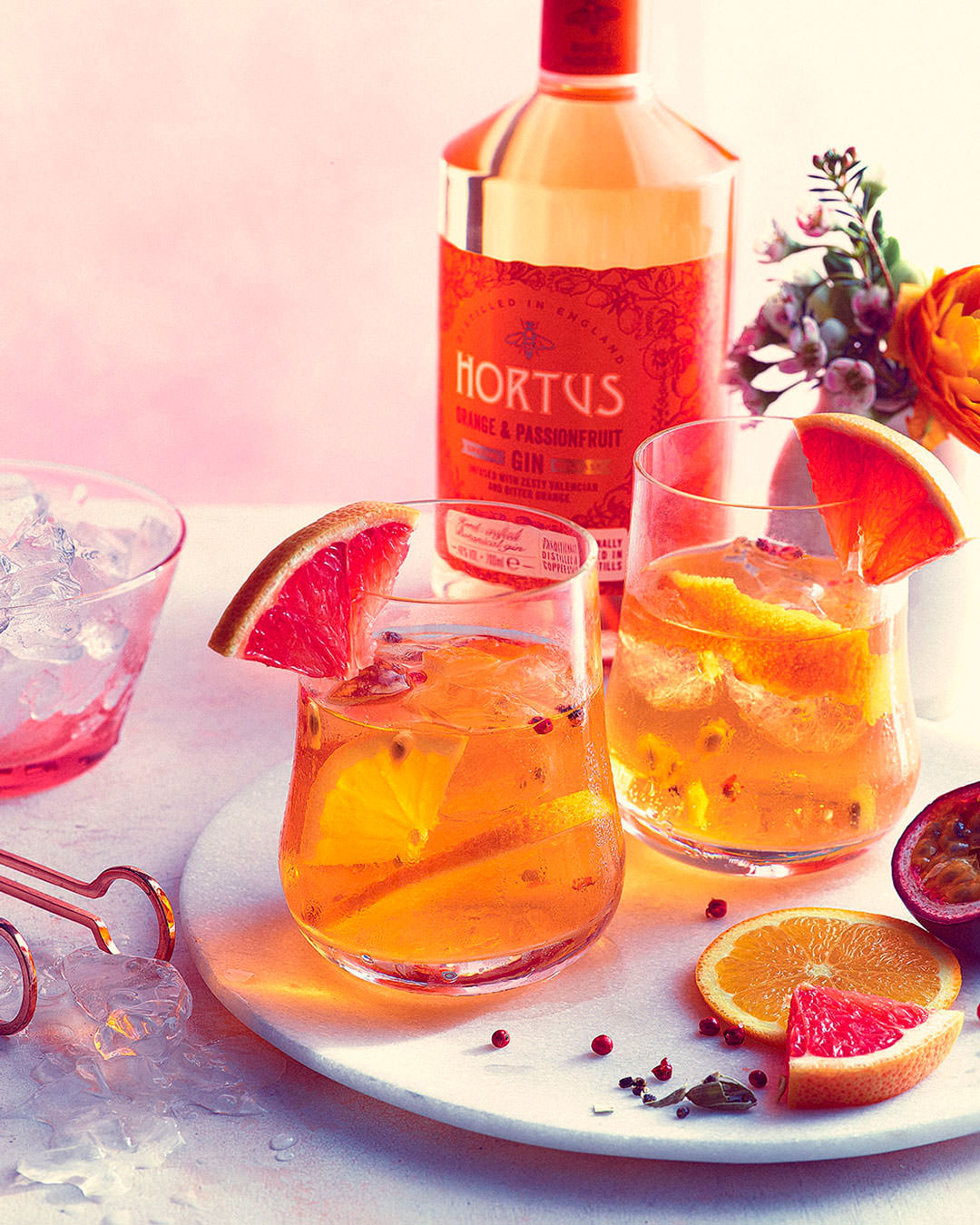Hortus Orange and Passionfruit gin and tonic, in glass served with grapefruit slices - London Food & Drinks Photographer