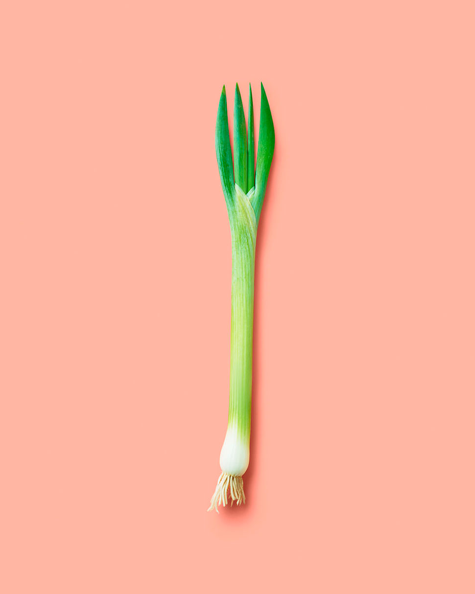 spring onion in a shape of folk on a pink backdrop - London Food & Drinks Photographer