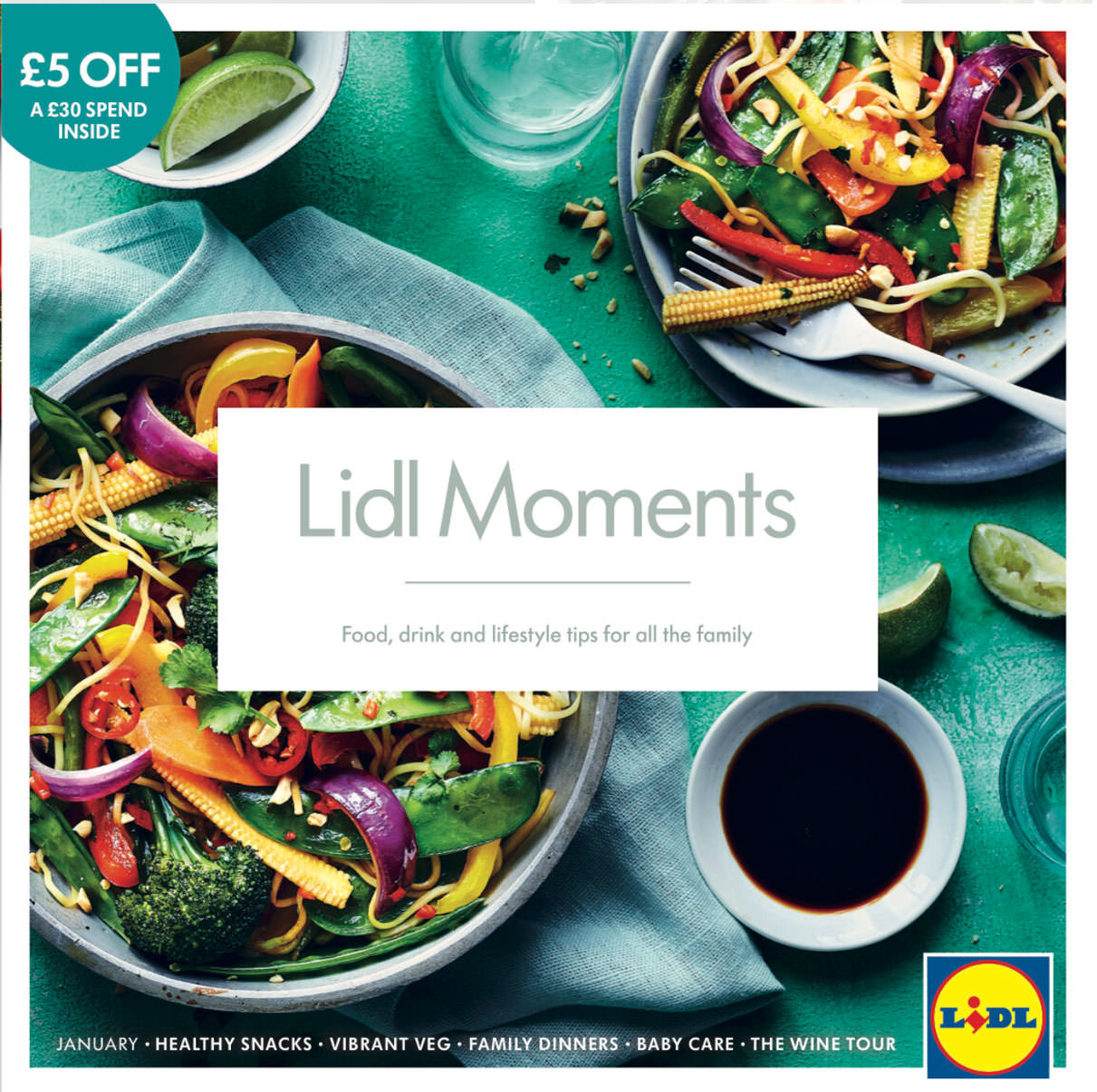 Lidl Moments Magazine Front Cover of fresh spring vegetables in a asian stir fry served with lime wedges and soya sauce